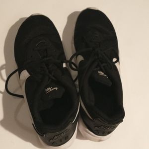 Black Nike Air athletic shoes